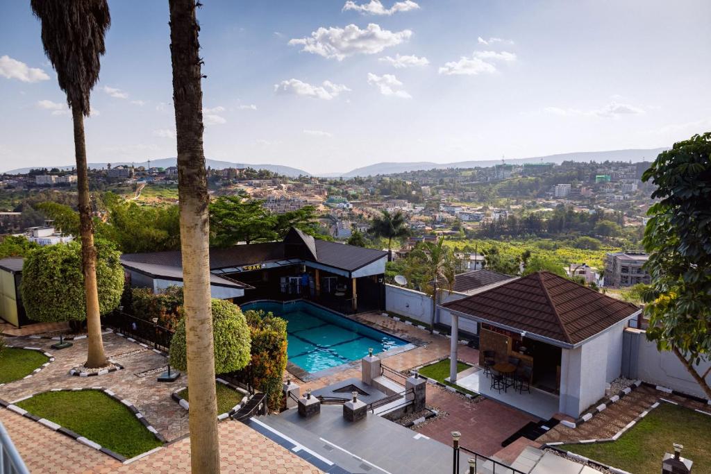 Poolside View Guest House — A hilltop guest house built around its pool, with the whole of Kigali below.