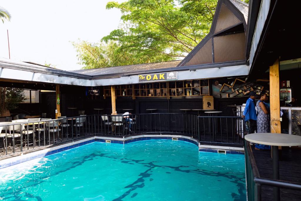 The outdoor pool and The Oak bar in daylight