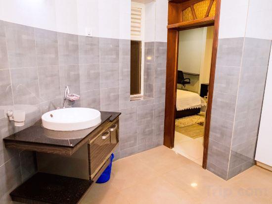 Executive ensuite vanity with view through to the bedroom