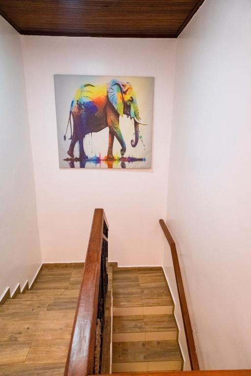 Upper landing with elephant artwork