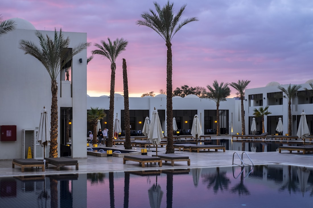 Guest house terrace and pool at dusk