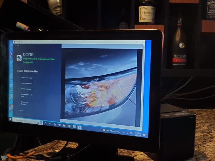 Sigeth Sales open on a point-of-sale terminal behind a bar counter